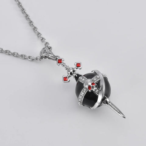 Terror's Crucige necklace with an onyx ball and red stones.