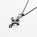 silver cross pendant on a chain