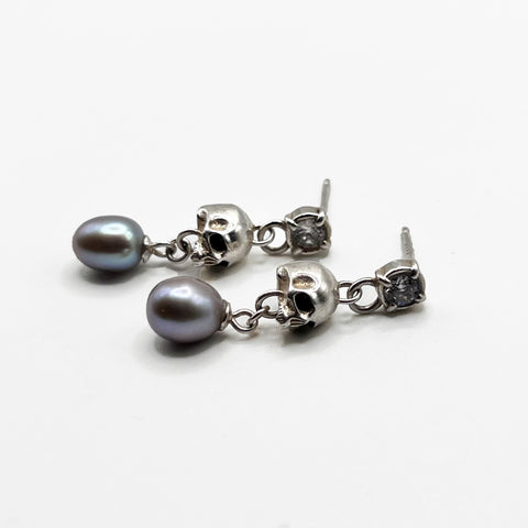 A pair of Silver Skull Head  earrings with black pearls